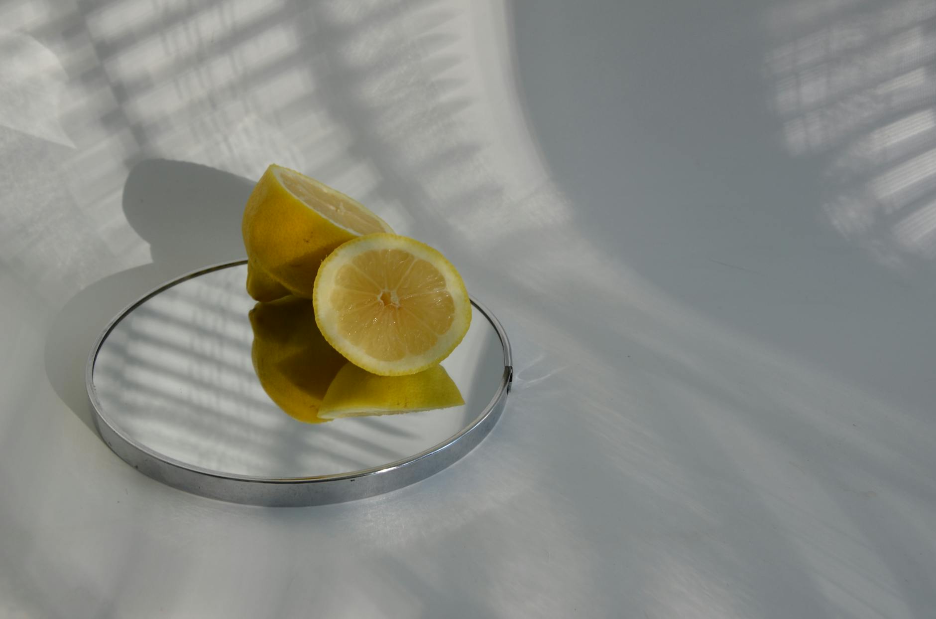 Bright lemons arranged on a yellow background symbolizing healing and renewal