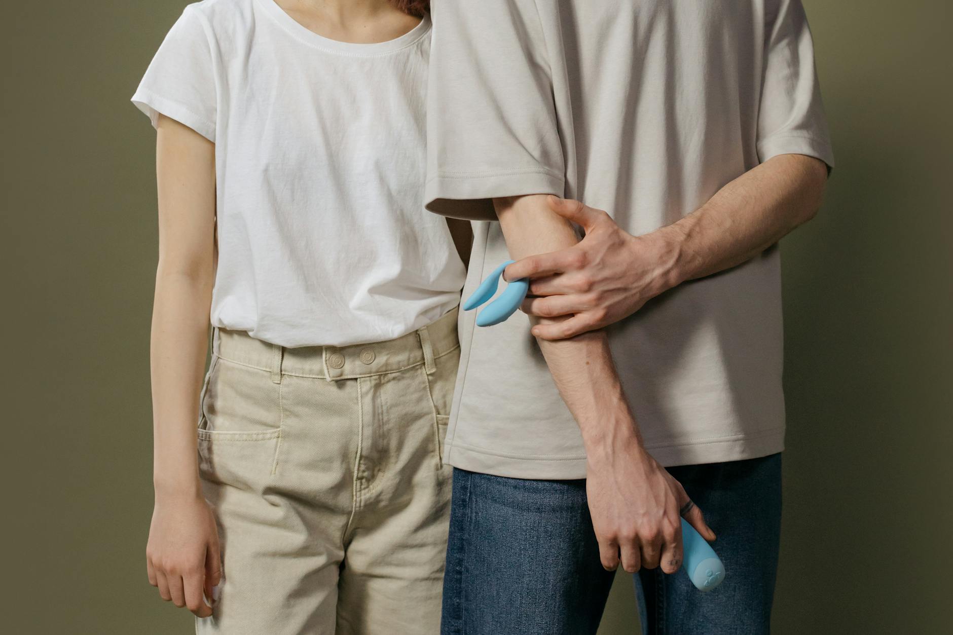 A couple embracing with intimacy and trust while exploring pleasure together